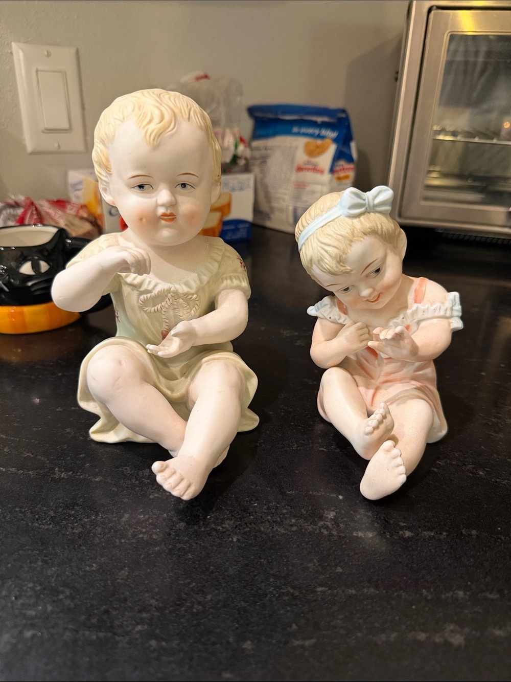 Porcelain / Bisque Piano Baby Figurines. No flaws